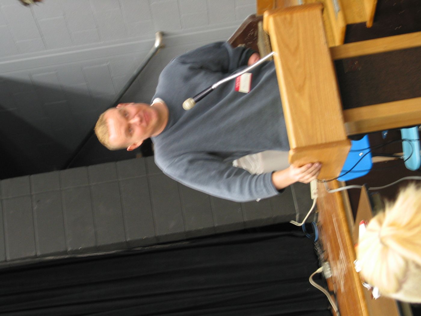 Lecture — Niskayuna High School assembly, Niskayuna, NY, 2003: photograph 2 (Looking through Matt’s work after the assembly)