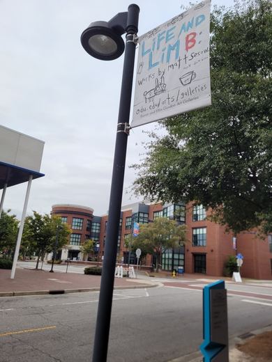 One of the seven original street banners Matt painted for the show.