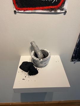 Mortar and Pestal used to grind coal by Matt Sesow, 2021