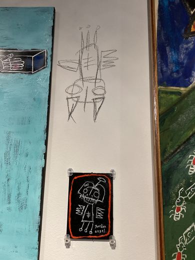 Icons drawn directly on the gallery walls.